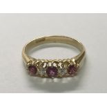 A 1920s 18carat gold ring set with alternatingRuby’s and Diamonds. Ring Size N