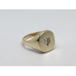 A gents 9ct gold diamond signet ring, approx 9.7g and approx size T.