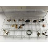 A collection of jewellery including earrings and pendants.