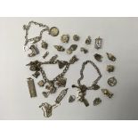 3 silver charm bracelets and a collection of mixed silver and white metal charms etc.