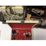 A tin and two jewellery boxes of costume jewellery - NO RESERVE