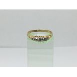 A circa 1930s 18ct gold five stone diamond ring, approx 2.5g and approx size P-Q.