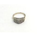 A 9ct gold apex set ring set with rows of diamonds, approx 2.7g and approx size L.