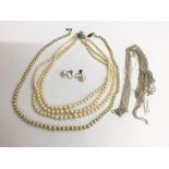 A 9ct gold clasp three strand pearl necklace, one other, earrings and failover thread necklace -