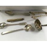 A collection of silver flatware and a mother of pearl fruit knife.