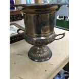 A box of silver plated ware including an ice bucket.