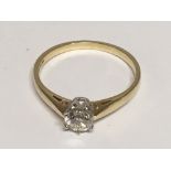 An 18carat yellow gold ring set with a brilliant cut solitaire 0.30 of a carat diamond size M.