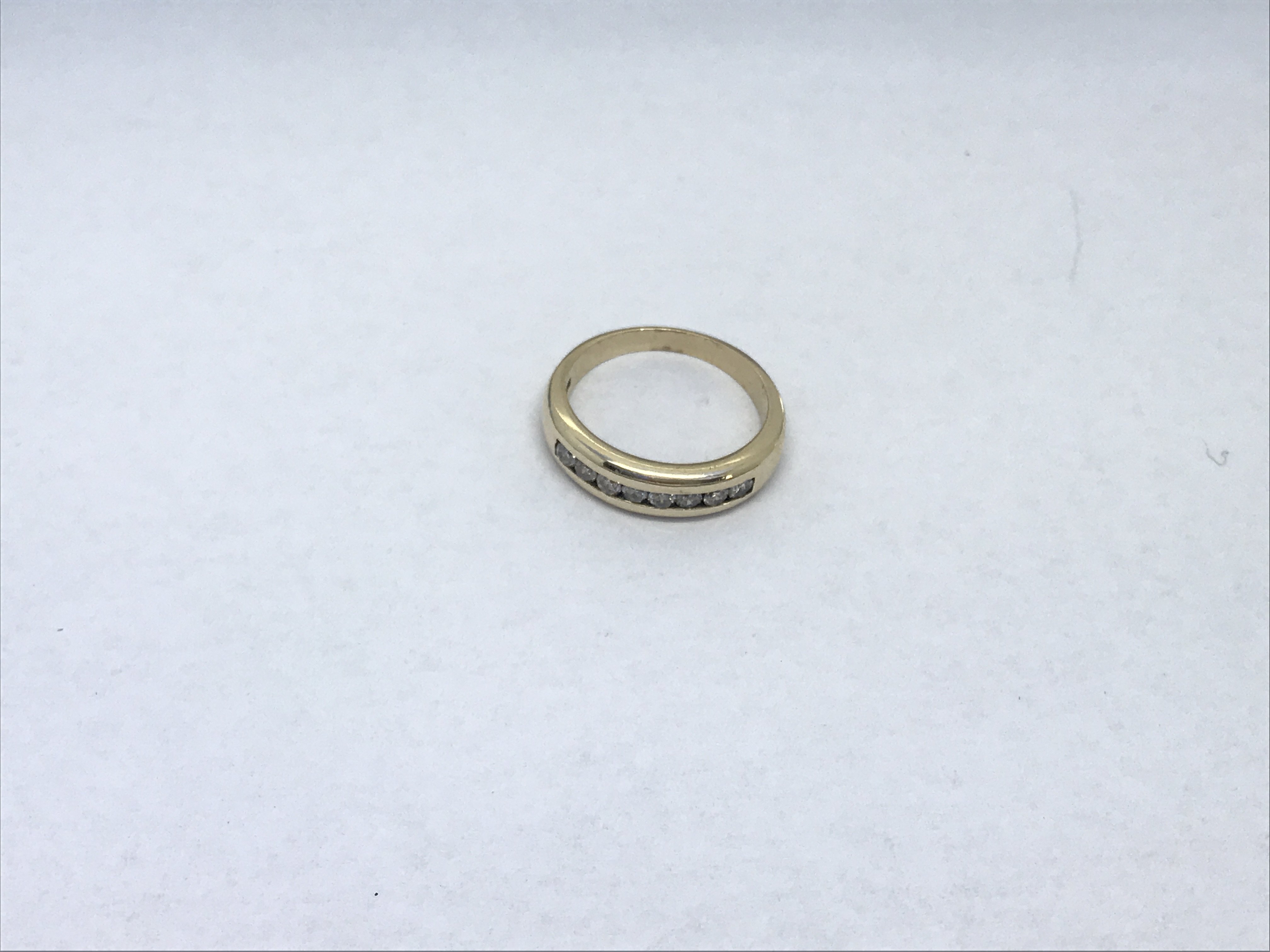 A 9ct gold half eternity ring set with 8 diamonds, approx .33ct, approx 4.7g and approx size P-Q. - Image 2 of 2