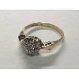 A 9carat gold diamond cluster ring. Ring size N