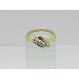 An 18ct gold five stone diamond ring, approx .20ct, approx 3g and approx size O.