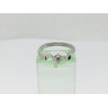 A 9ct white gold solitaire diamond ring, approx 2.3g and approx size M.