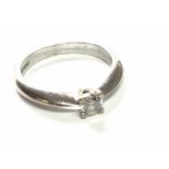 An 18carat white gold ring set with a solitaire diamond approx 0.25 of a carat.