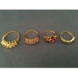 4 9ct gold and stone set rings. (Approx 13g).