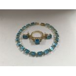 A 14 ct gold jewellery set inset with topaz s