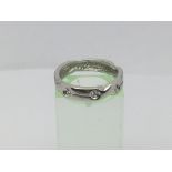 An 18ct white gold six diamond ring, approx 3.7g and approx size N-O.