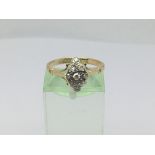 An 18ct gold diamond cluster ring, approx.10ct, approx 3.4g and approx size M.