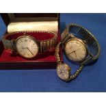 A gents 9ct cased Rotary wristwatch together with a Gents 9ct cased Record de luxe watch and a