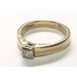 A 9carat gold ring set with a solitaire princess cut diamond 0.15 of a carat. Ring size K-L