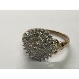 A 9carat gold diamond cluster ring approximately 0.50 total carat weight.ring Size Q