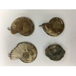 3 silver mounted ammonite fossils and 1 silver mounted quartz pendant.