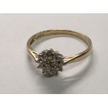 A 9carat diamond cluster ring. Ring size P.