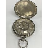 A heavy Hallmarked silver pocket watch.