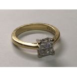 An 18carat gold ring set with four princess cut diamond approximately 0.50 of a carat ring size K-L