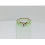 A 9ct gold solitaire diamond ring, approx 1.7g and approx size L-M.