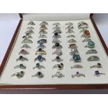 A collection of fifty rings with gem stone inset a