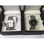 2 gents boxed Hugo Boss watches.