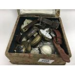 A box of mixed watches and watch parts
