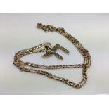 A heavy 9ct gold chain with a 9ct diamond set pendant.10.9g.