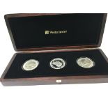 A Westminster set three kings silver crown set .