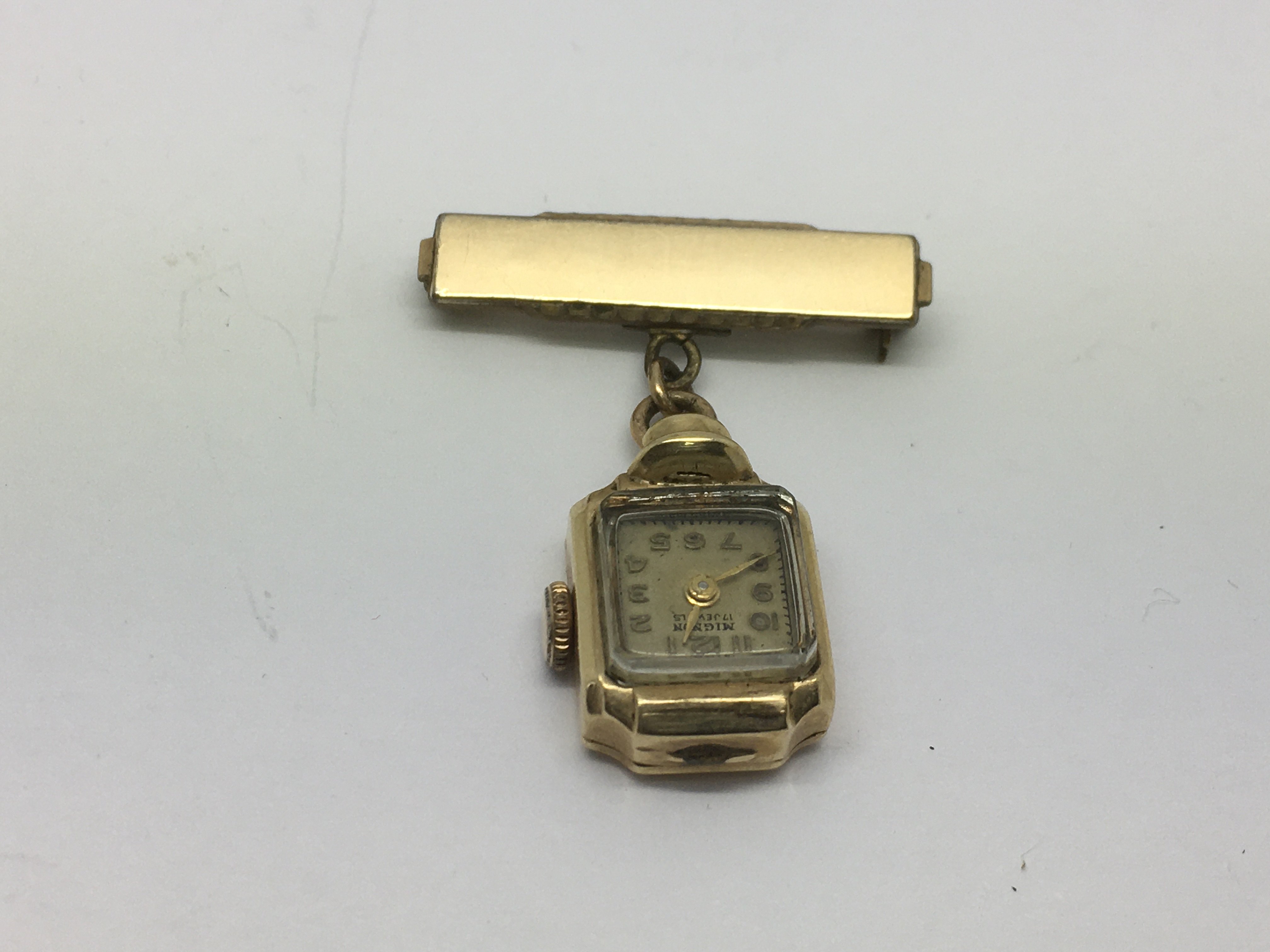 A 9ct gold cased broach watch, approx 9g - NO RESERVE