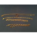 4 9ct gold chains and a 9ct gold wedding band. (Approx 23.9g)