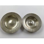 Two small silver dishes LONDON hallmarks11 cm, 9.5 cm and a silver ashtray Birmingham hallmarks 9 cm