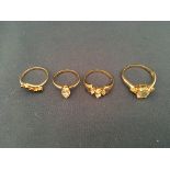 4 9ct Gold and stone set rings. (Approx 9g).