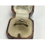 A 1920s 18ct gold 3 stone diamond ring. Approx 2.5g, ring size T.