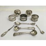 A group of silver napkin rings and spoons including a Georgian pair.Approx 180g - NO RESERVE