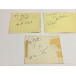 Three Rolling Stones signatures comprising Keith Richards (signed Richard), Bill Wyman and Charlie