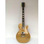 A 2009 Gibson Les Paul Traditional electric guitar in a goldtop finish, serial number 004291343,