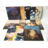 A collection of Moody Blues and solo LPs.