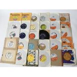 A collection of over 50 reggae 7inch singles by various artists including Trojan and Blue Beat