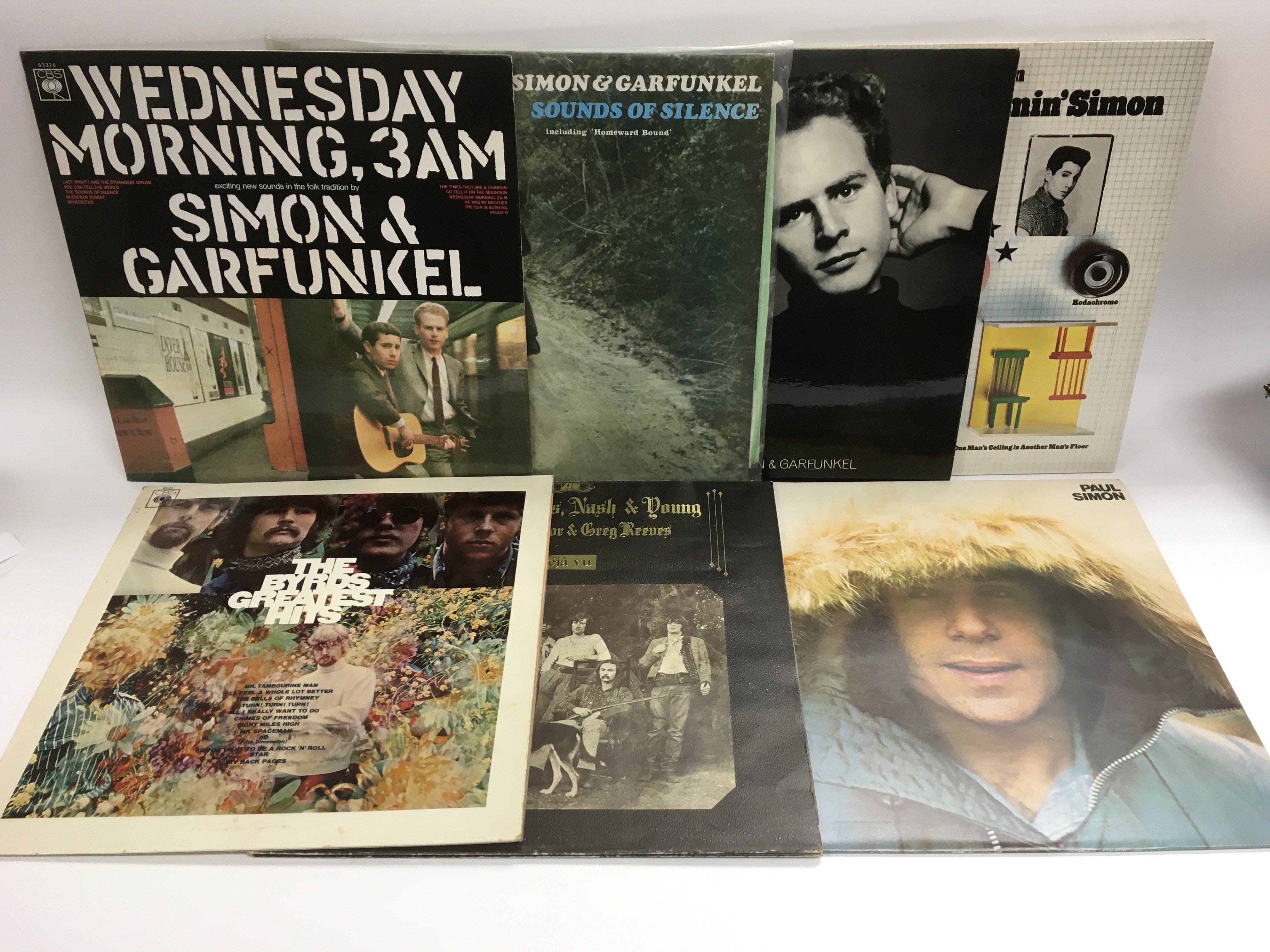 Seven US folk rock LPs by various artists including Simon & Garfunkel, The Byrds and CSNY.