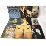 A collection of prog and psych rock LPs by various artists including ELO, Mike Oldfield, Barclay