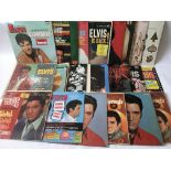A collection of various Elvis Presley LPs.