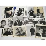 A collection of press and publicity photos of various artists including Dr Feelgood, Erasure,