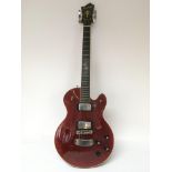 A circa 1970s Hagstrom electric guitar in a wine red finish, comes supplied with a hard Gibson carry
