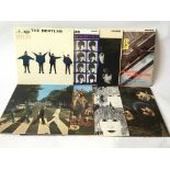 Eight early UK pressings of The Beatles LPs comprising 'Please Please Me', 'Sgt Pepper', 'Abbey