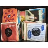 A plastic crate and two boxes containing a large collection of 7inch singles by various artists from